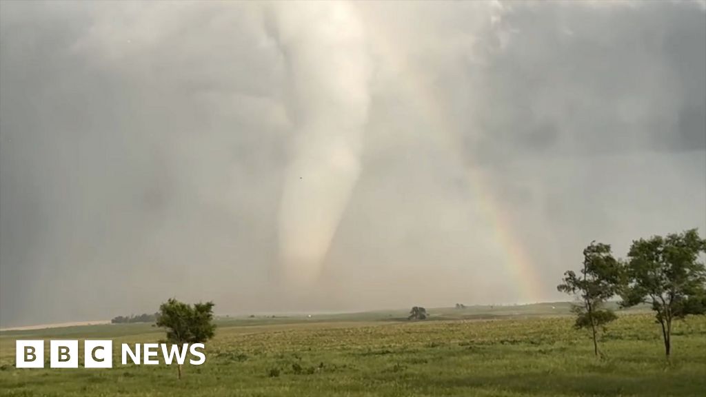‘Fantastic’ moment a huge tornado crosses a rainbow