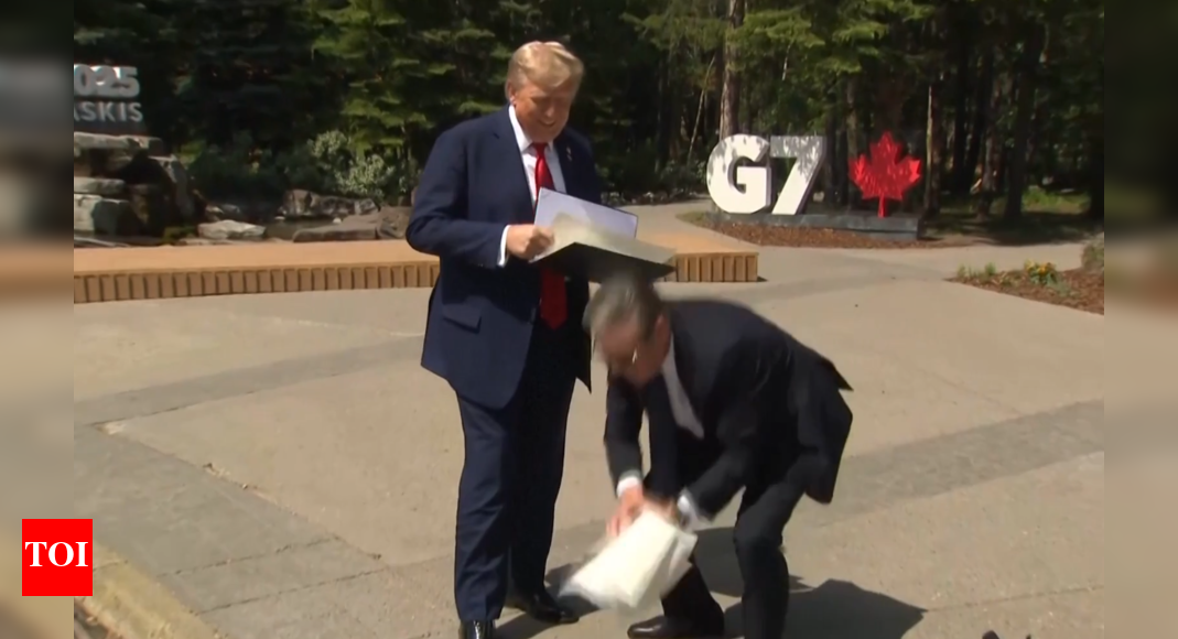 Watch: Starmer scrambles to pick up Trump’s papers as UK-US trade deal signed at G7 Summit; ‘Had no choice,’ UK PM explains