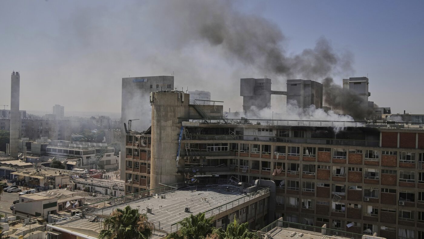 Israel vows retribution after Iranian missile hits hospital : NPR