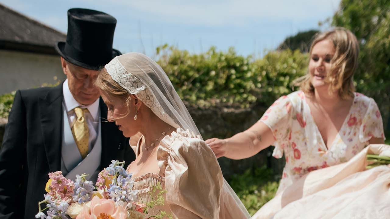 How A Lifelong Obsession With Marie Antoinette Inspired This Stylist Bride’s Bespoke Pink Dress For Her Cornish Wedding