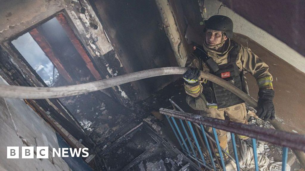 Buildings burn after a fresh Russian air strikes